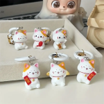 Portachiavi in lega con gattino e campanellino bianco